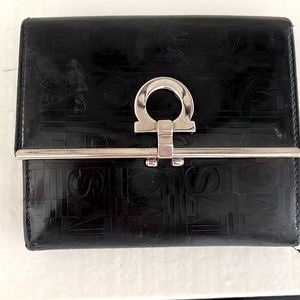 Salvatore Ferragamo black wallet.